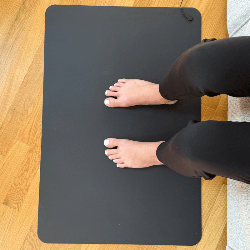 Sitting On The Earthing Floor Mat Reading 1