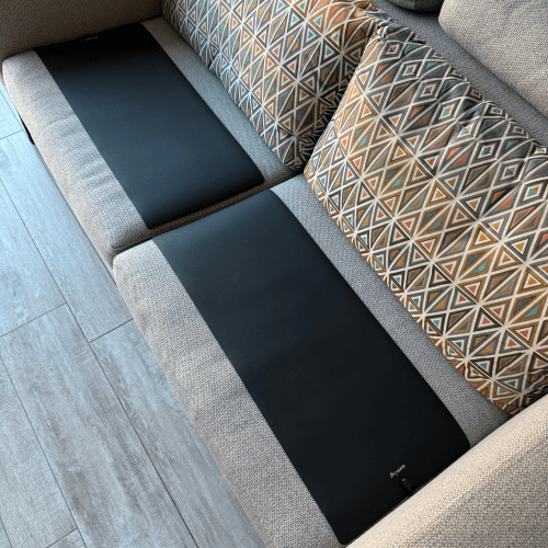 Two Earthing Universal Mats on the couch